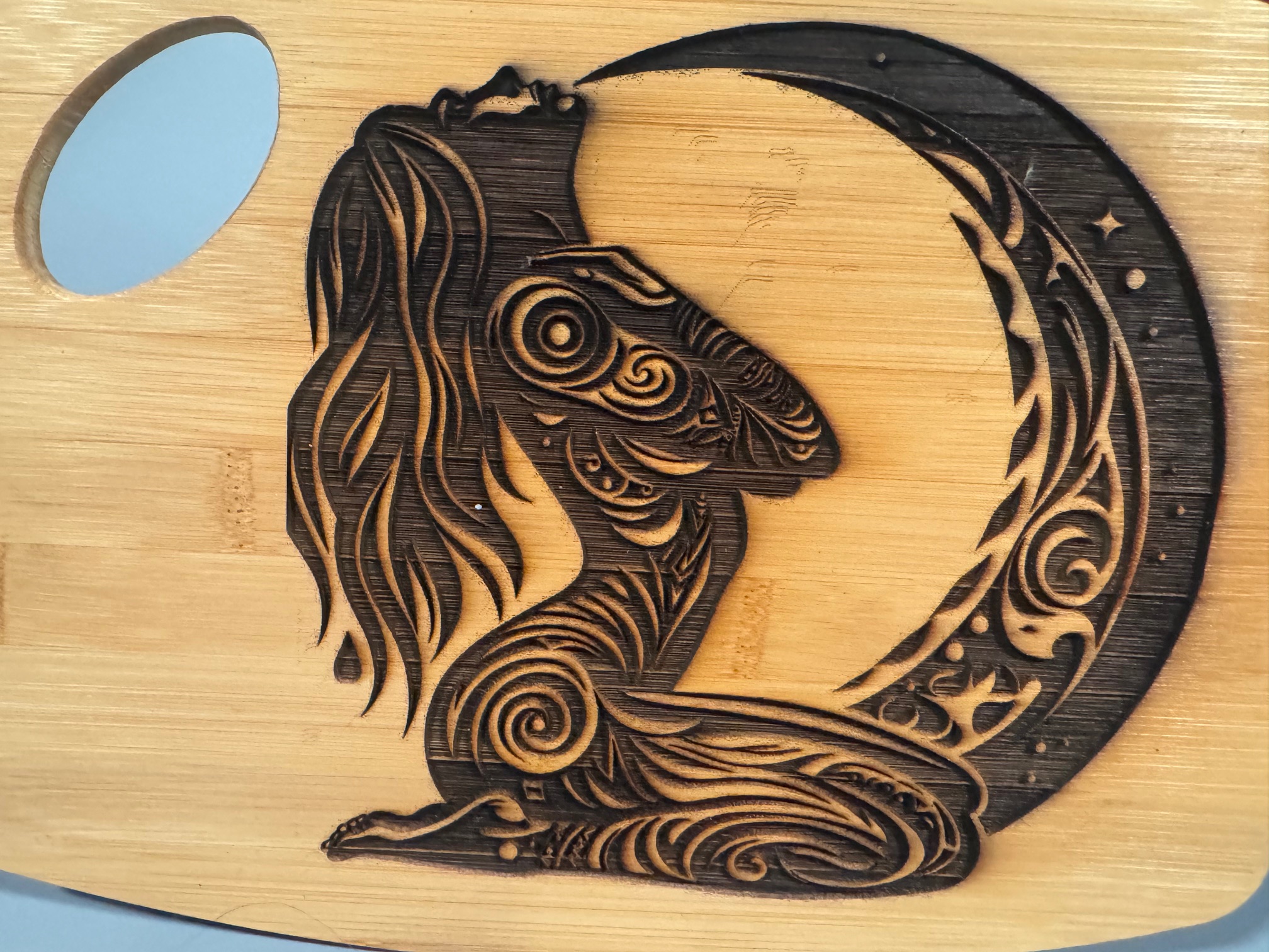 <i>Moon Maiden</i><i>Cutting Board</i>